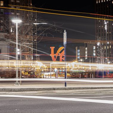 Philadelphia LOVE Park Sign with light trailing and Philadelphia Art Museum in background